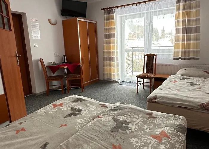 לינה וארוחת בוקר Tokarczyk 3*